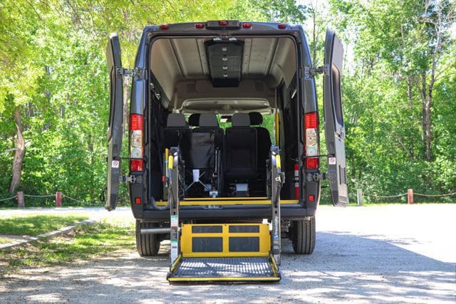 wheelchair lift deployed in rear position of wheelchair van
