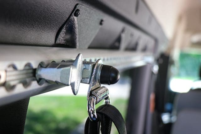 shoulder harness restraint for securing wheelchair inside a van