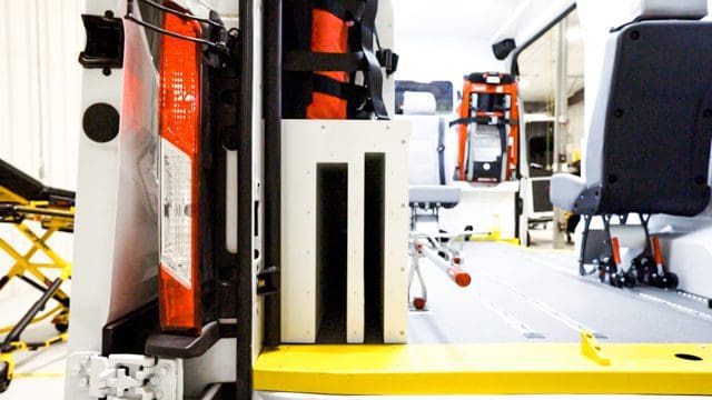 Spine board storage spot in a MoveMobility non emergency mobile medical van