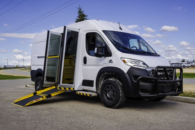 Winter tires and grille guard on a MoveMobility Mobile Counselling Van